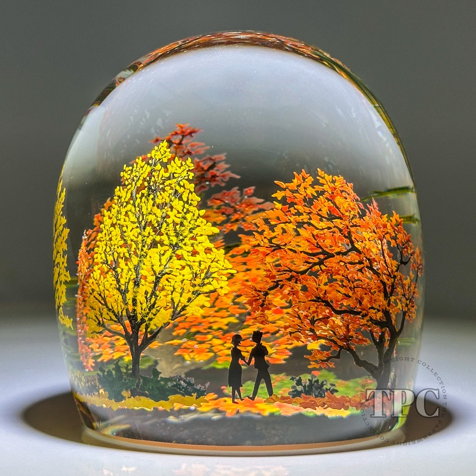 Alison Ruzsa 2023 Glass Art Sculpture Hand-Painted Enamels "Autumn Walk" Amongst Orange and Yellow Tree