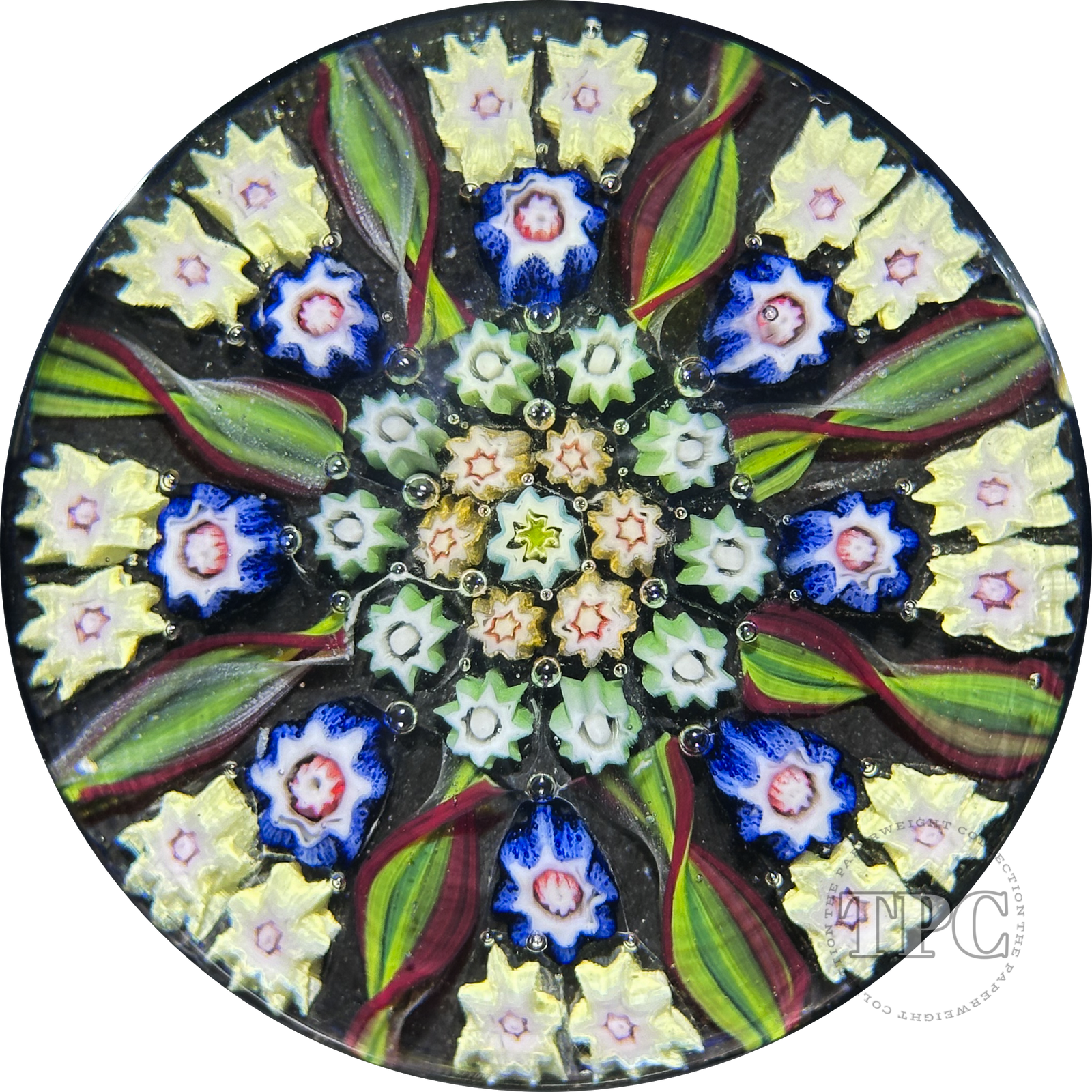 Vintage Vasart Glass Art Paperweight with Radial Millefiori & Ribbon Twists on Black