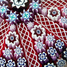 Peter McDougall Glass Art Paperweight Radial Filigree and Millefiori on Red Ground