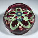 Faceted Perthshire 1983 "O" Glass Paperweight Patterned Complex Millefiori Garlands on Transparent Ruby Ground