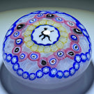 Baccarat Crystal 1974 L'Homme Au Fusil Gridel Hunter with Rifle Murrine Interlaced Complex Millefiori Garland & 17 Silhouettes on Upset White Muslin Lace