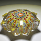 Vintage Strathearn Pressed Star Glass Art Paperweight with Colorful Concentric Millefiori & Ribbon Twists on Yellow Ground