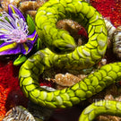 Ken Rosenfeld 2023 Glass Art Paperweight Flamework Green Scaled Snake on Red Sand with Pebbles, Aventurine, and Perennial Flowers