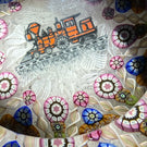Perthshire Paperweights PP56 Patterned Complex Millefiori on Upset Muslin Cushion with a Train Decal