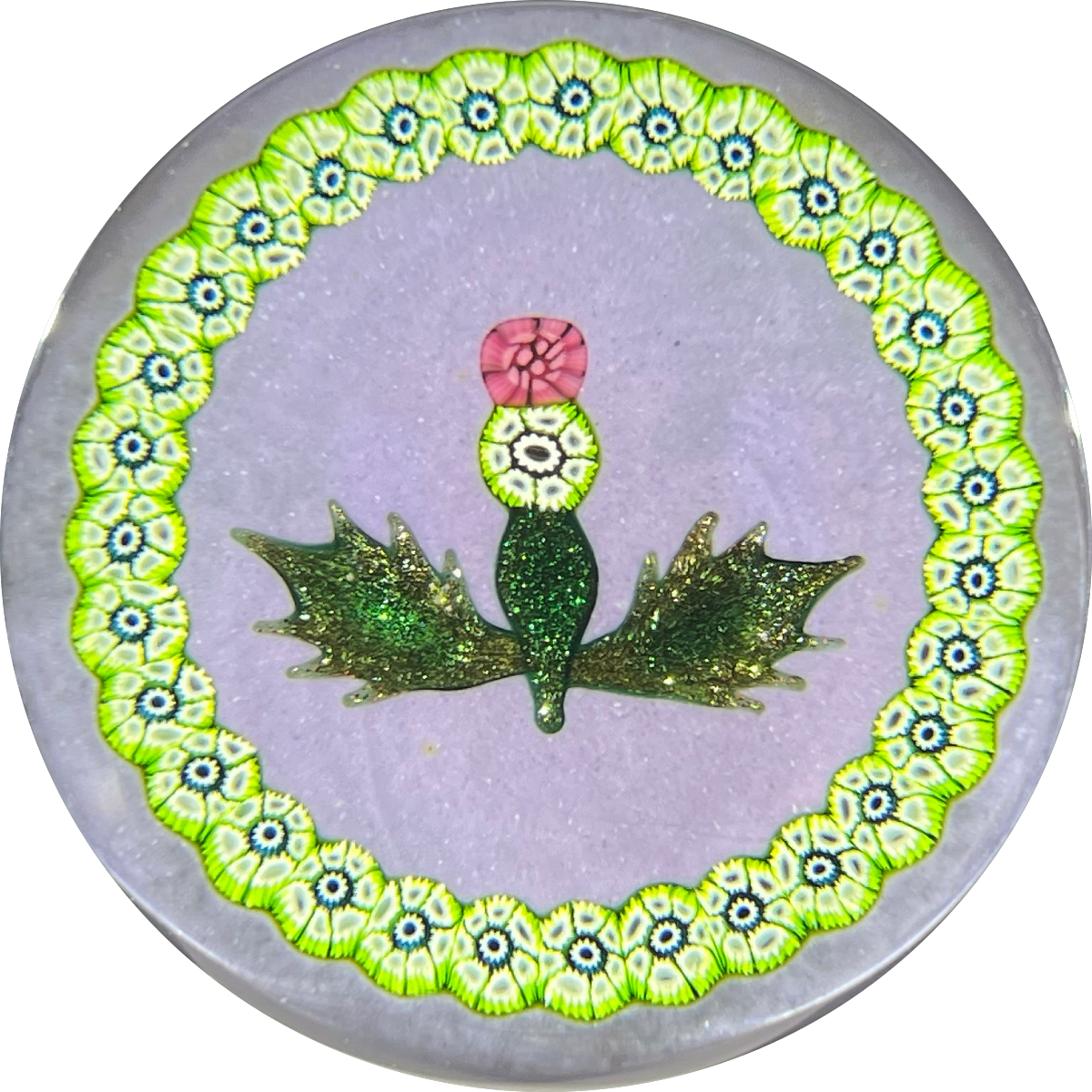John Deacons Glass Art Paperweight Flamework Scottish Thistle with Aventurine Leaves and Garland of Millefiori on Lavender Ground